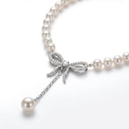 Coquette Diamond Bow Pearl Lariat